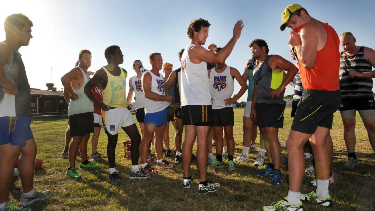ON TRACK: Natimuk senior football coach Tim Friend leads a joint training session with Horsham RSL Diggers footballers ahead of next week's merger vote. Picture: PAUL CARRACHER
