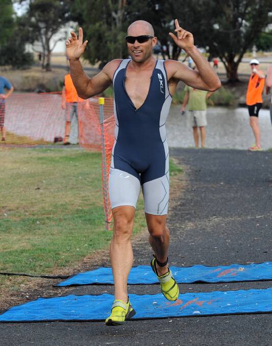 WINNER: Warrnambool's Rohan Creed takes out the 2014 Horsham Triathlon on Saturday. Picture: PAUL CARRACHER