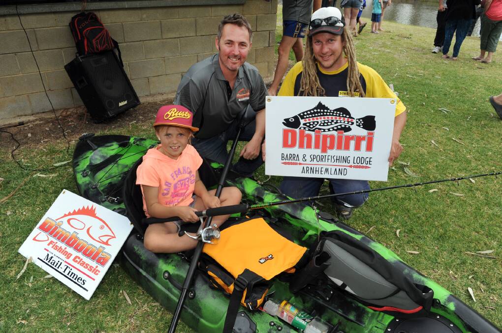 WINNERS: Wimmera Mail-Times Dimboola Fishing Classic organiser Stoph Pilmore, centre, with junior winner Mayci Porter, 9, of Pimpinio and senior winner Royden Klemm of Horsham. Picture: PAUL CARRACHER