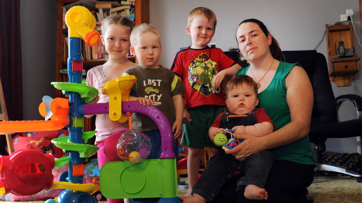 SAVE TEAM MIDWIFERY: Horsham mother Collette Okely is disappointed Wimmera Health Care Group has axed its Team Midwifery program. Mrs Okely, pictured with children Felicity, 8, Zac, 5, Chris, 3, and Jaxon, 8 months, is one of more than 400 people who have signed an online petition to save the service. Picture: PAUL CARRACHER