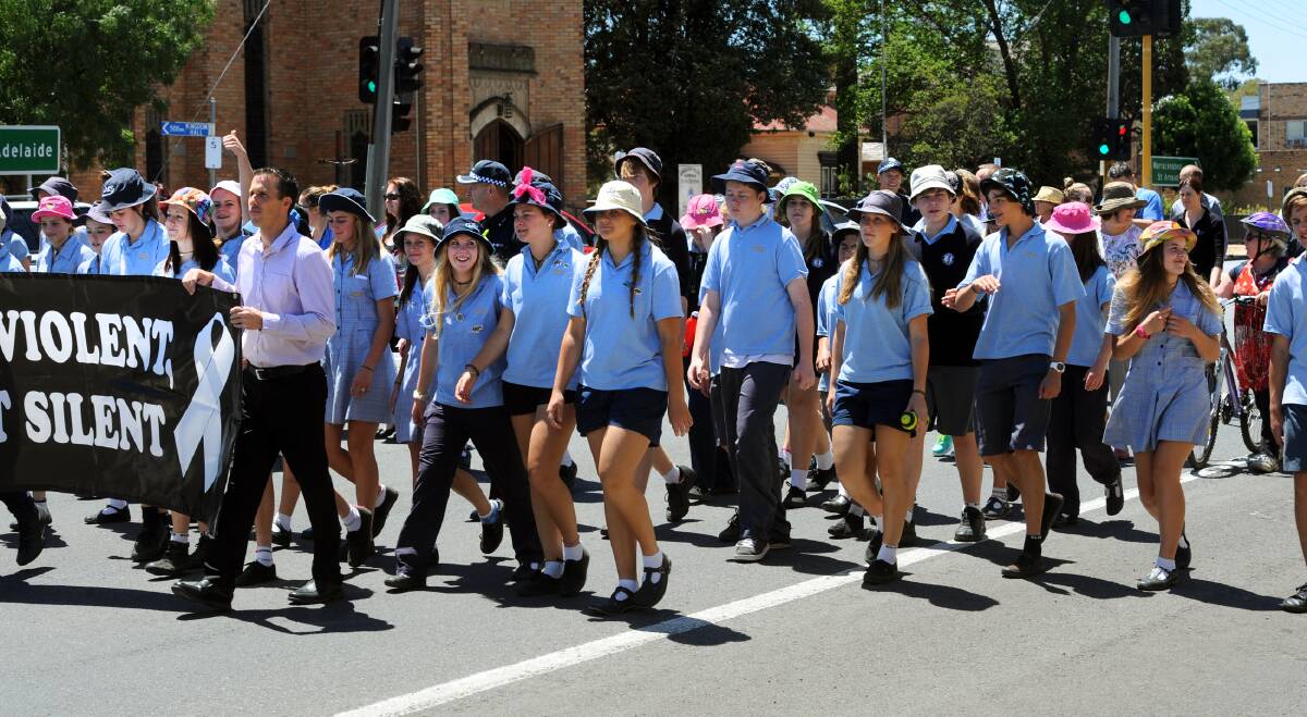 NOT VIOLENT, NOT SILENT:Horsham College students join in the city's annual White Ribbon Walk Against Violence on Friday. A record crowd participated in this year's event. Picture: PAUL CARRACHER