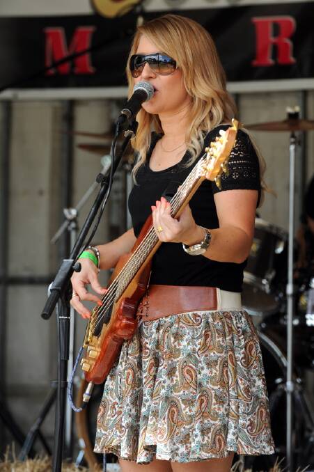PERFORMANCE: Kimberly Nitschke performs at the Lake Charlegrark Country Music Marathon.