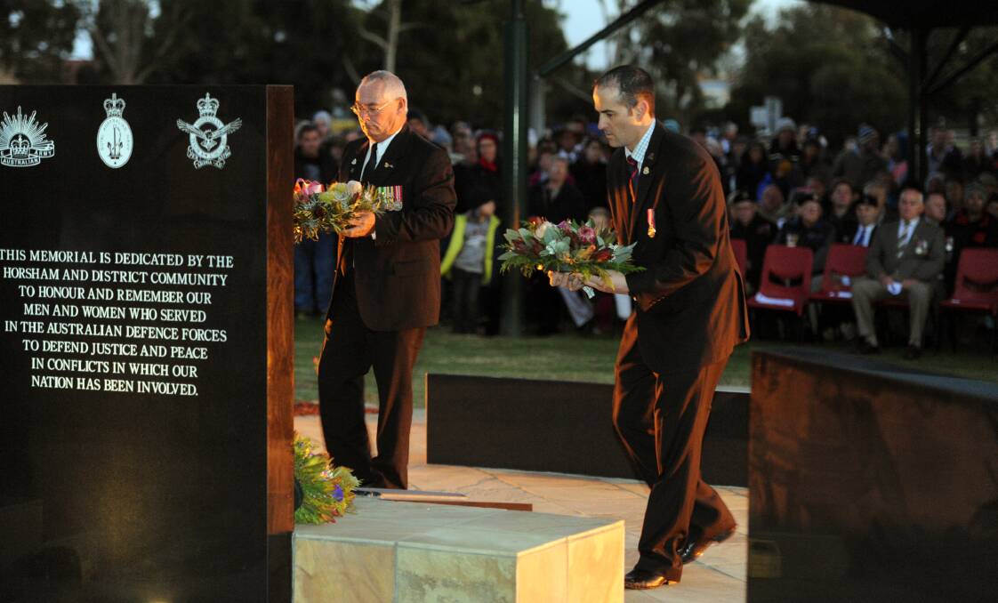 Bob Lockwood and Stuart Chilver laying Wreaths at Horsham Anzac Day dawn service. 