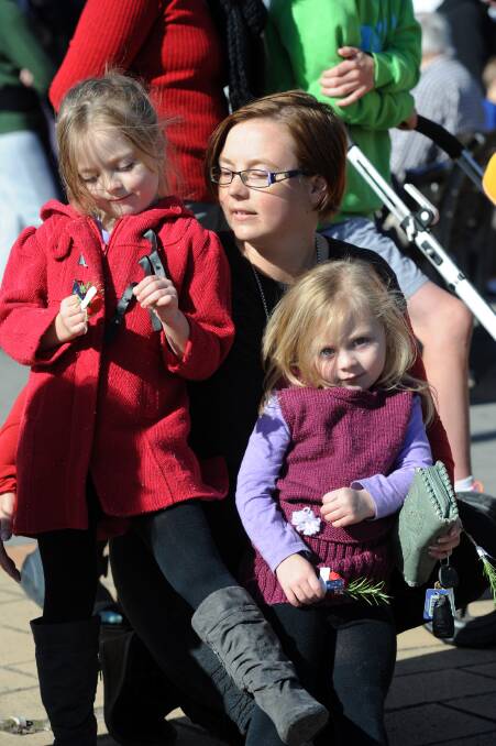 Rachael, 6, Kathryn Camilleri and 
Holly, 4, at Horsham Anzac march. 