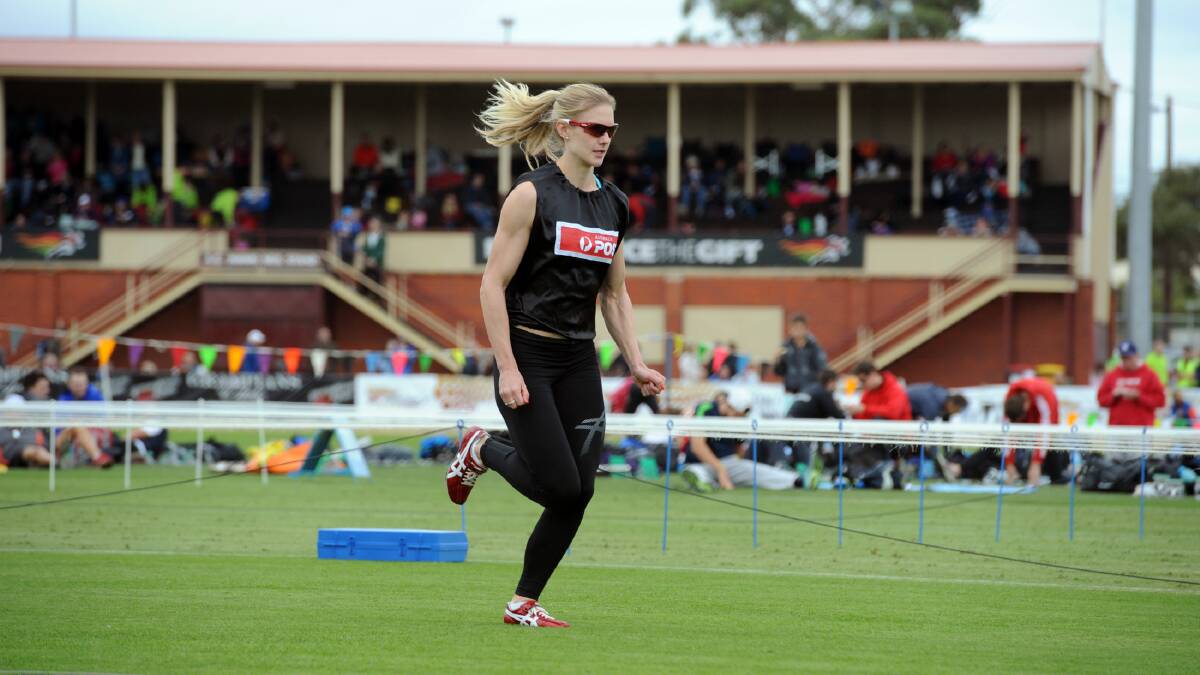 Melissa Breen warms up at the 2014 Stawell Gift. 