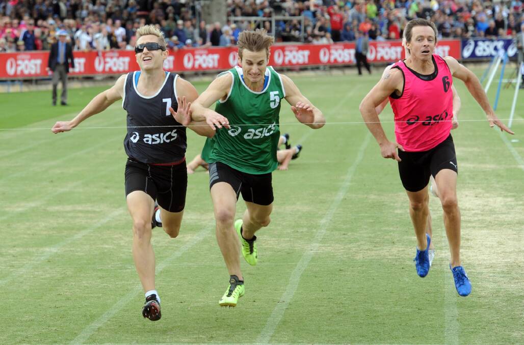 Bill McManus 400m final, won in a dead heat by Ryan McNamara, blue, (not in picture) and Cameron Clayton, green.
Clayton and Jarrad Dartnall, black, crashed at the finish. 
