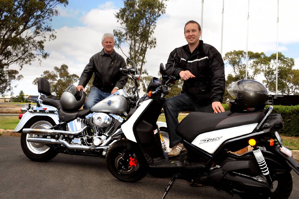 ALL BIKES WELCOME: John Aisbett and his Harley Davidson with Peter Rudge and his scooter get ready for the 15th Salvation Army Charity and Toy Ride tomorrow. Picture: PAUL CARRACHER