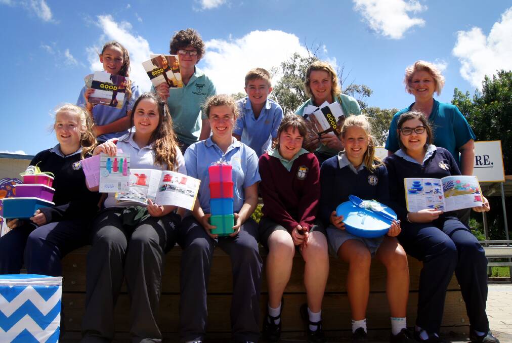 SAY G'DAY: Horsham and St Brigid's college students will host a Tupperware fundraiser on Saturday. Pictured from left, back, are Erin Wills, Daniel Kirby, Ryan Queale, Seb Dalgleish and Tupperware consultant Tracey Miller; front, Tamika Baker, Ella Larkin, Alana Carter, Kellsie Anderson, Charlotte Launder and Emily Vettos. Picture: EMILY FRIEDRICHSEN-HAY