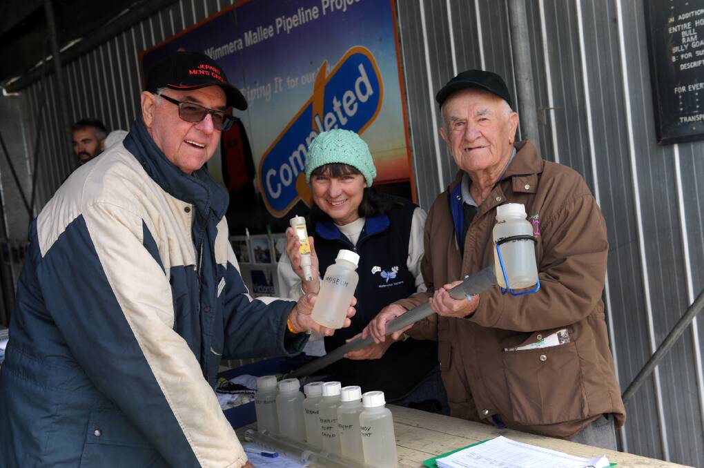 TWO DECADES ON: Jeparit Waterwatch celebrated twenty years of monitoring the region's water systems with a barbeque last week. Pictured from left, original members David Livingston, Jeanie Clark and Col Clee. Picture: PAUL CARRACHER