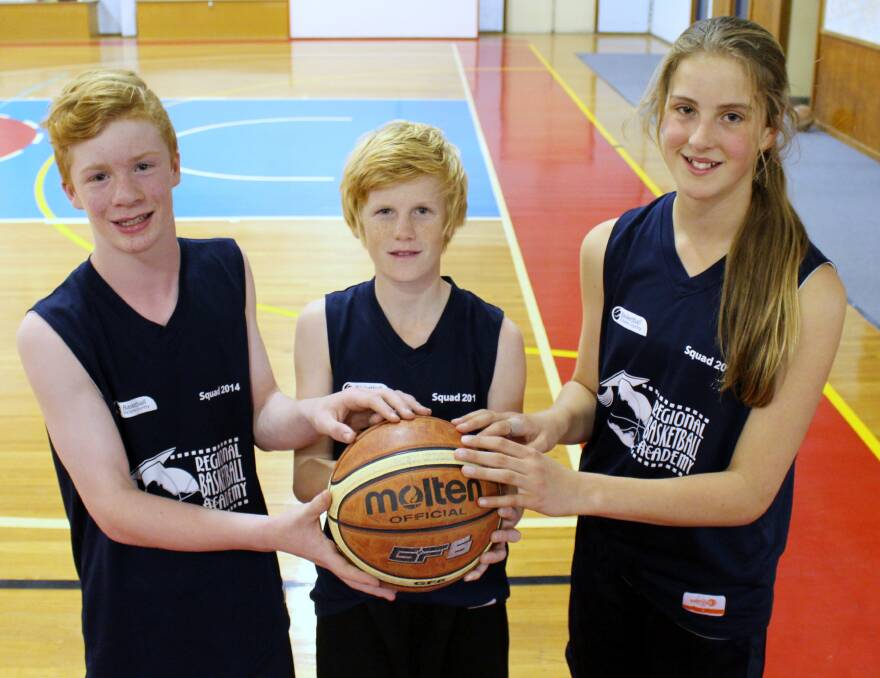 HARD WORKERS: Tate Fennell, Jeremiah McKenzie and Maggie Caris were three of four Wimmera junior basketballers selected for next month's Southern Cross Challenge. They were part of Basketball Victoria Country's academy program this year. Absent is Jordie McAuliffe. Picture: CONTRIBUTED