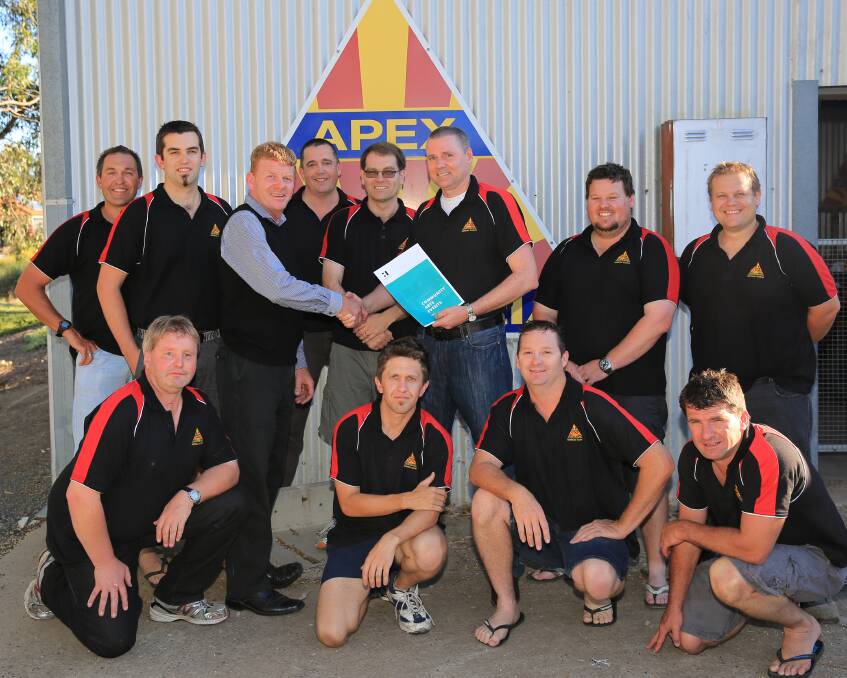 DONATION: Apex members Travis Kerr, president Marty Montgomery, Dave Frizon, treasurer Anthony Dowling, 'Bottles' Phillips, Steve Murray, Nathan Werner, Shannon Merrow, Ash Batchelor, Michael White and Wayne Flicock present a $10,000 cheque to Horsham Rural City Mayor Mark Radford. Picture: KELLY McRAE