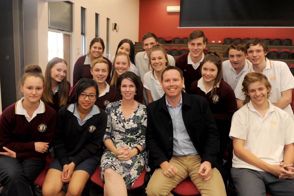 CLASS PHOTO: Member for Lowan Emma Kealy and Member for Mallee Andrew Broad with Horsham College year 11 legal studies students. Picture: SAMANTHA CAMARRI