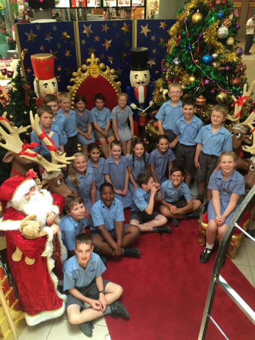 PERFORMERS: Students from the Holy Trinity Lutheran School year four choir at the Horsham Plaza on Monday, where they performed Christmas carols for the shoppers. Picture: CONTRIBUTED