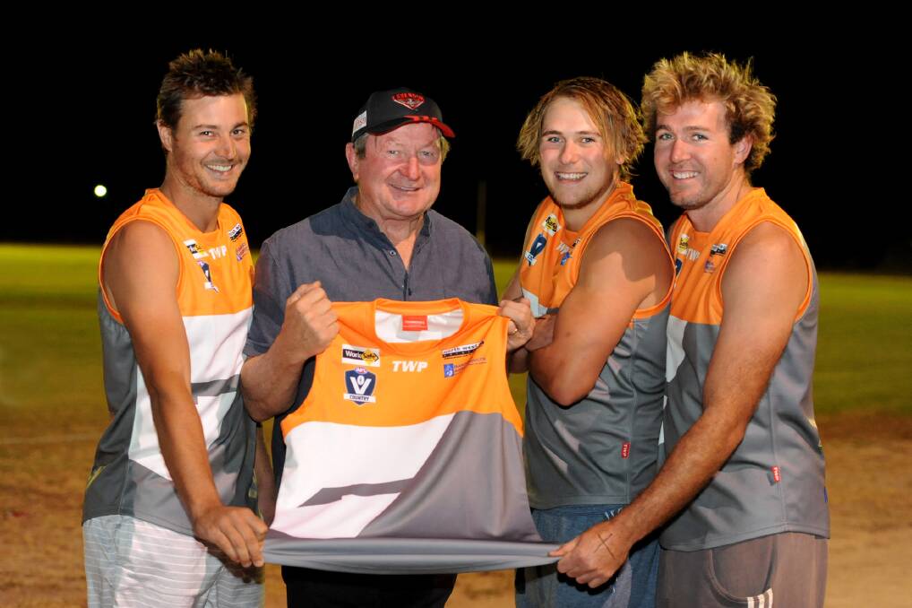 ON THE MOVE: Former Essendon and Greater Western Sydney coach Kevin Sheedy, second from left, helps the Southern Mallee Giants launch their season last month with players Simon Cook, Tyler Lehmann and Lachy Foott. The Giants could play in the Horsham District Football Netball League next season after the move was recommended by AFL Victoria Country. Picture: SAMANTHA CAMARRI