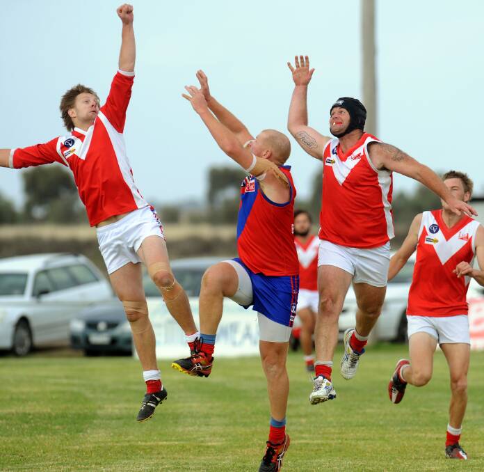 ROCK SOLID: Josh Beddison, middle, was a big factor in Kalkee's win over Swifts at the weekend. Picture: PAUL CARRACHER