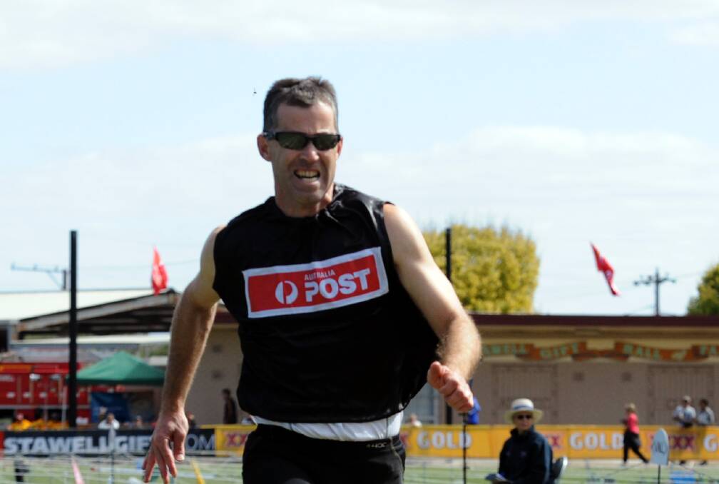 SECOND PLACE: Ararat athlete Marcus Cooper, pictured at the 2012 Stawell Gift, finished second in his 100-metre Hank Neil Veterans’ Handicap heat on Saturday. Picture: PAUL CARRACHER