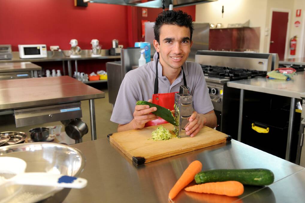 GRATE EXPECTATIONS: Dimboola Memorial Secondary College student Cameron Cauchi gets ready to host 150 primary school students for a day of cooking and food education. Picture: SAMANTHA CAMARRI