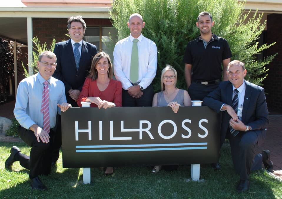 Wimmera Health Care Group chief executive Chris Scott, right, welcomes a $75,000 donation for the Wimmera Cancer Centre from Hillross Horsham staff. Pictured, from back left, Wayne Simmons, Dean Winfield and John Manserra; and front, Richard Goudie, Penelope Manserra and Alisha Cameron. Picture: CONTRIBUTED
