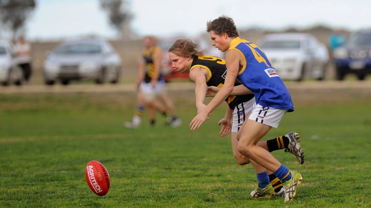 FOOT RACE: Natimuk United's Kym Wilkinson chases the ball. Picture: SAMANTHA CAMARRI