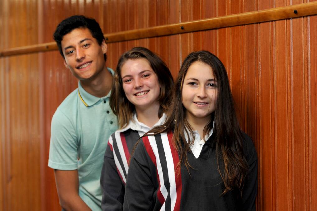 BIENVENUE: French students Maxime Tanghe, year 11, Typhaine Lecuyer, year 10, and Laurene Forgeot, year 10, have settled into St Brigid's College in Horsham during a six-week stay in the Wimmera. Picture: SAMANTHA CAMARRI