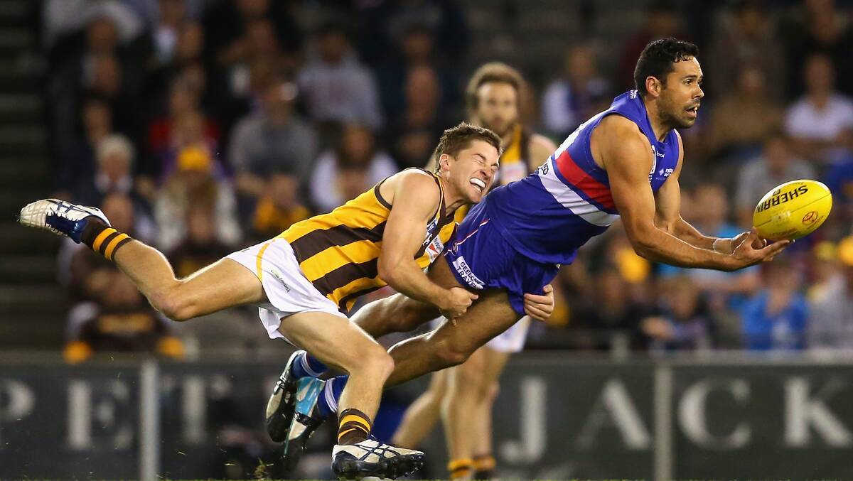 STAR OF THE SHOW: Brett Goodes fires off a handball under pressure in Footscray’s VFL grand final  in against Box Hill at the weekend. Picture: GETTY IMAGES