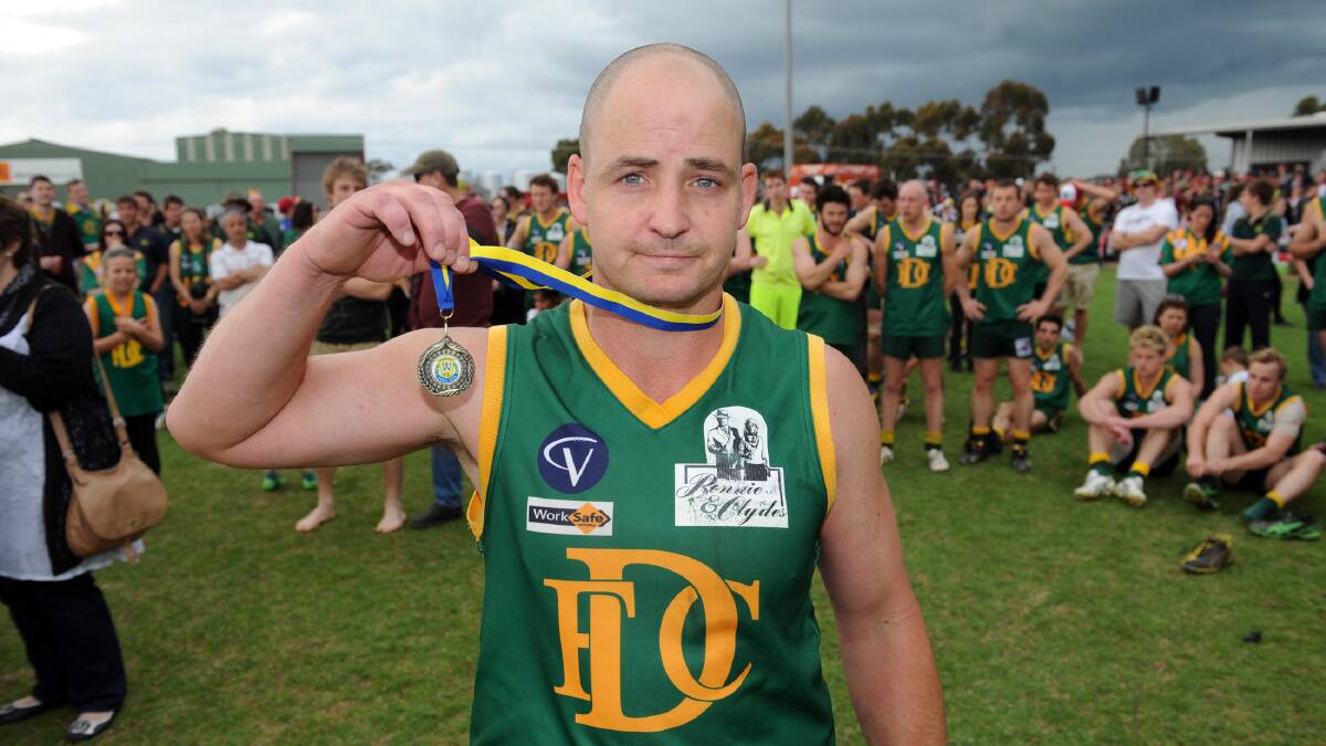 CHANGING TEAMS: Dimboola’s Mathew Everett - pictured after Dimboola's 2013 grand final loss - has signed as Pimpinio's senior coach for 2015. Picture: PAUL CARRACHER