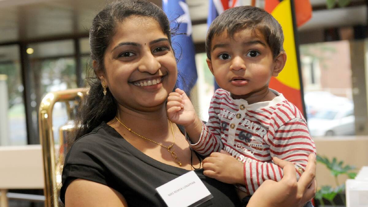 NEW BEGINNING: Remya Lonappan celebrates becoming an Australian citizen with son Johaan Pulickan, 1, at Horsham Civic Centre on Monday night. Picture: SAMANTHA CAMARRI