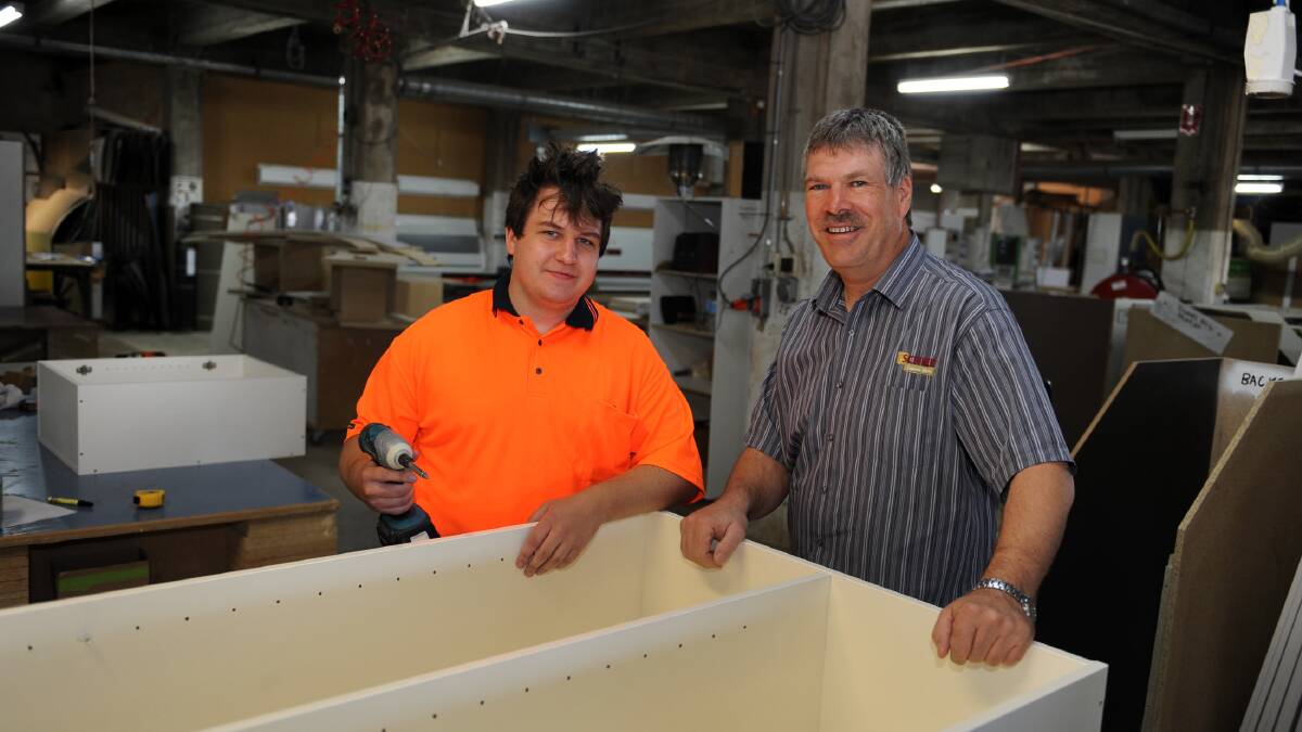 OPPORTUNITY: Shane Whitehead with his new boss Mal Schier at Schier Cabinet Makers in Murtoa. Picture: PAUL CARRACHER