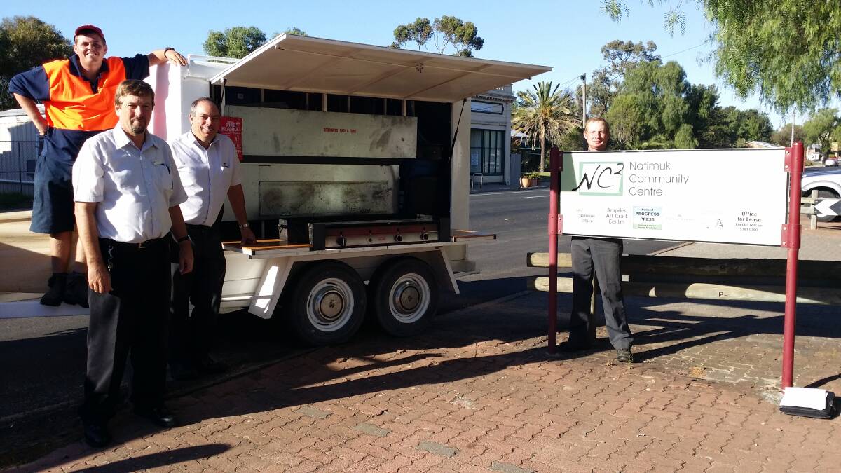 Natimuk Farmers Market Plus volunteer Kane Sudholz, Horsham Rural City Council's Martin Duke and John Griffiths and Natimuk Agricultural and Pastoral Society vice-president James McCredden with the new barbeque trailer donated by the Wimmera Caravan Club. Picture: CONTRIBUTED