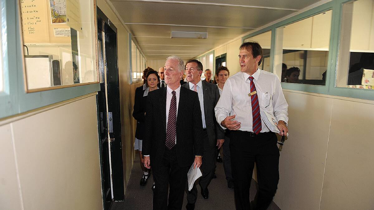 TOUR: Former Horsham College priccipal Frank Spiel takes Victorian Education Minister Martin Dixon and Member for Lowan Hugh Delahunty on a tour of the school in 2012. Picture: PAUL CARRACHER