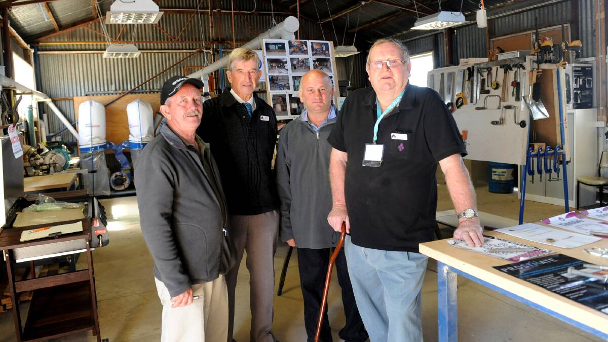 MAIN MEN: Visitor Larry Penny of Horsham with Natimuk Men’s Shed members Ewen Cameron, Bryan McPhee and Norm Fraser at the Natimuk Show on Saturday. Picture: SAMANTHA CAMARRI