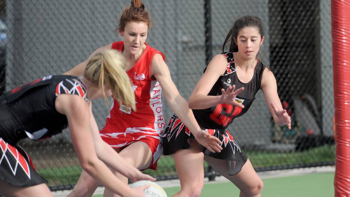 PRESSURE: Noradjuha-Quantong goal attack Sammi Avery, right, evades Taylors Lake defender Grace Howden on Saturday. Avery was one of the Bombers’ best in the 69-10 win. Picture: SAMANTHA CAMARRI