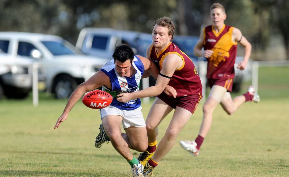 Kaniva-Leeor United's Jonty Brown and Border Districts' Mark Lemon battle for possession in a match lasy year. Picture: SAMANTHA CAMARRI