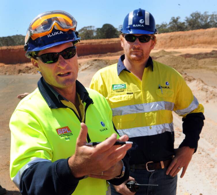 INFORMATION: Iluka Resources external relations manager Rod Jones and rehabilitation manager Hamish Little discuss the company’s operations at its former Douglas mine site on Wednesday. Picture: PAUL CARRACHER