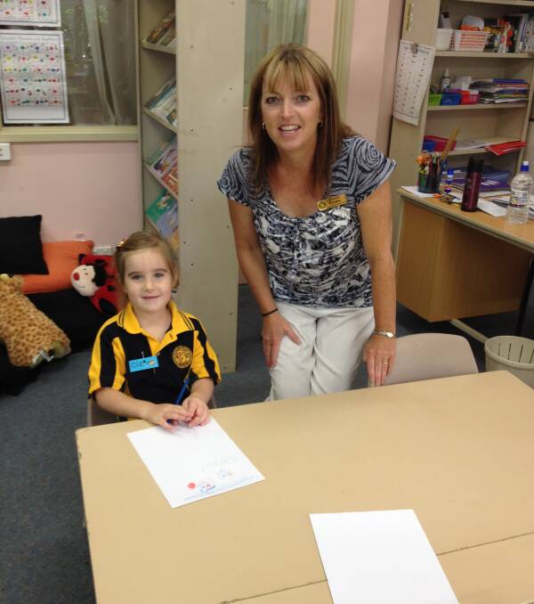 Clear Pohlner with her new teacher Mrs Purdue at her first day of prep at Horsham West Primary School.