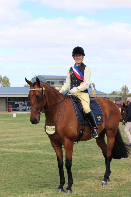 WINNERS: Lower Norton’s Cindy Francis and her horse King Chorus won a sash at the Natimuk Agricultural and Pastoral Show on Saturday.