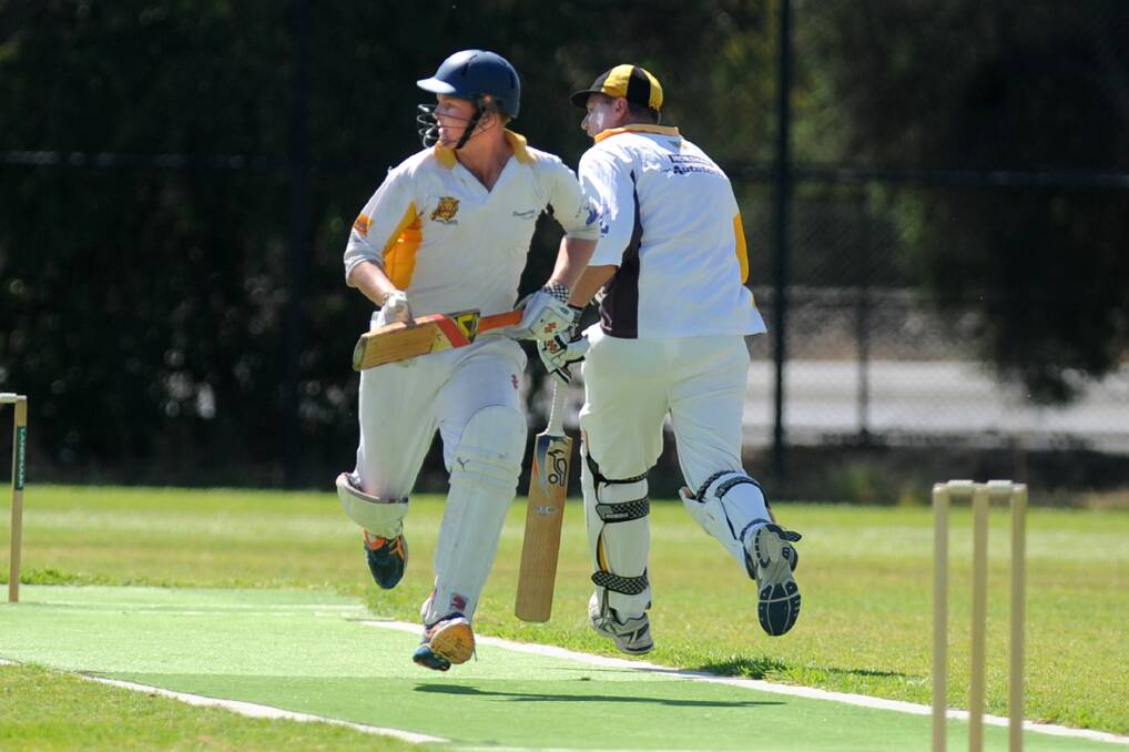 Lachie Pymer and Ash Wright bat for the Tigers during the Jung Tigers v Homers C Grade grand final.