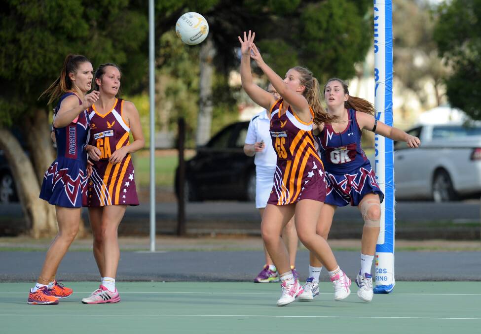 Horsham's Zoe Heard and Steph Thomson in action against Warrack Eagles Ellie Baxter and Briodi McKenzie earlier this year. The teams will face each other in the grand final on Saturday. Picture: PAUL CARRACHER