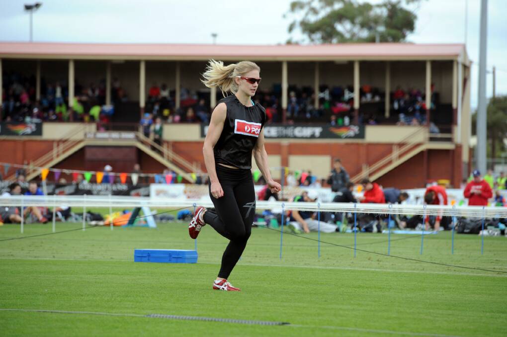 IN WITH A CHANCE: Melissa Breen warms up at the 2014 Stawell Gift. Picture: PAUL CARRACHER