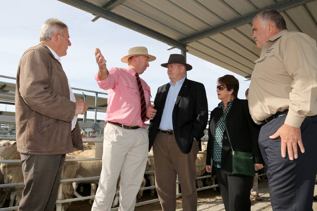 Horsham Mayor David Grimble and Andrew Adamson speak with Governor-General Peter Cosgrove and Lynne Cosgrove at the Horsham Regional Livestock Exchange with Paul Christopher. Picture: THEA PETRASS