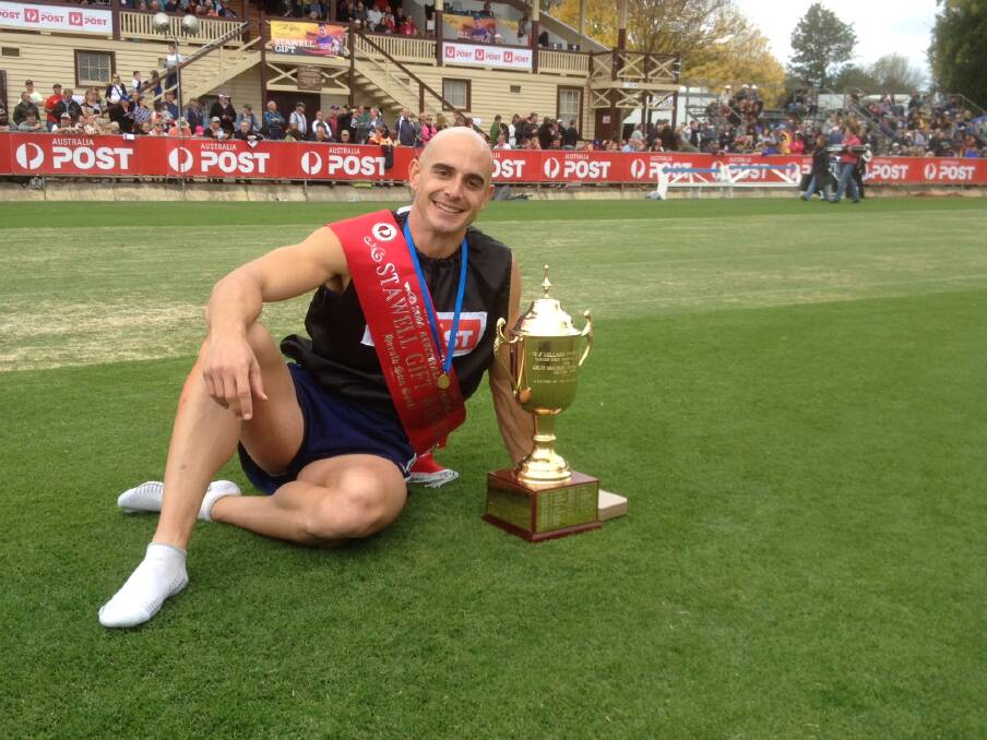 Luke Versace is all smiles after his Stawell Gift 2014 win. Picture: PAUL CARRACHER