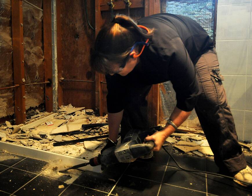 Horsham's Jo Robertson works on renovating her house. This could be you! Picture: SAMANTHA CAMARRI