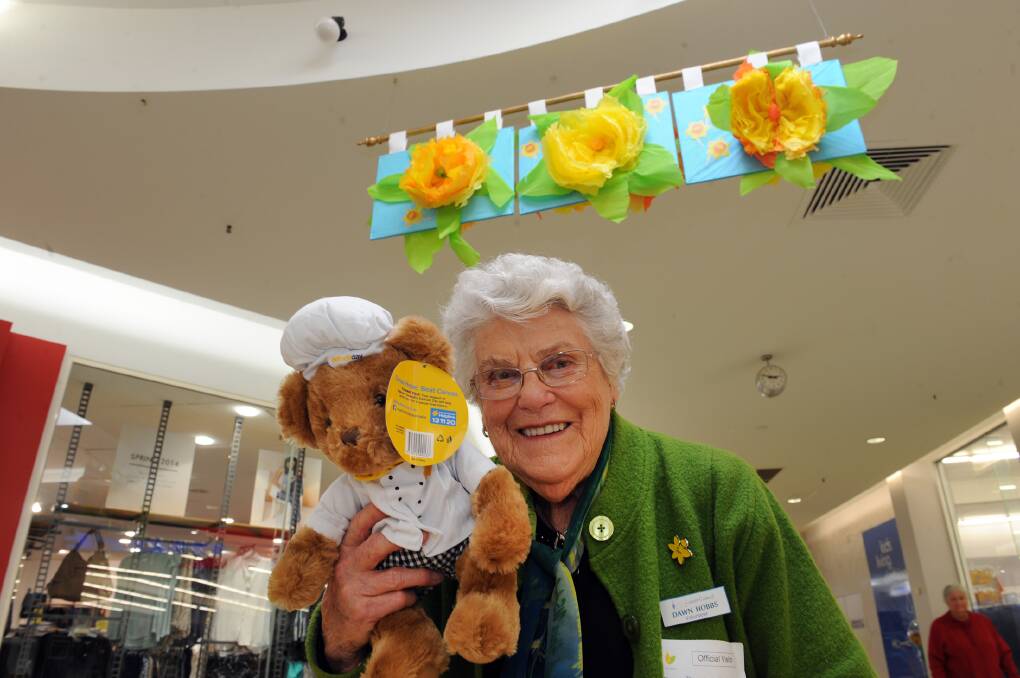 FOR A GOOD CAUSE: Horsham Cancer Council’s Dawn Hobbs sells items to raise money as part of Daffodil Day in Horsham Plaza on Thursday. Daffodfil Day helps raise money for cancer research. Picture: PAUL CARRACHER