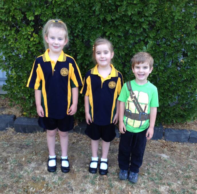 Year two student Katie Pohlner and her siblings Clear, prep, and Otto, kinder, get ready for the year ahead.