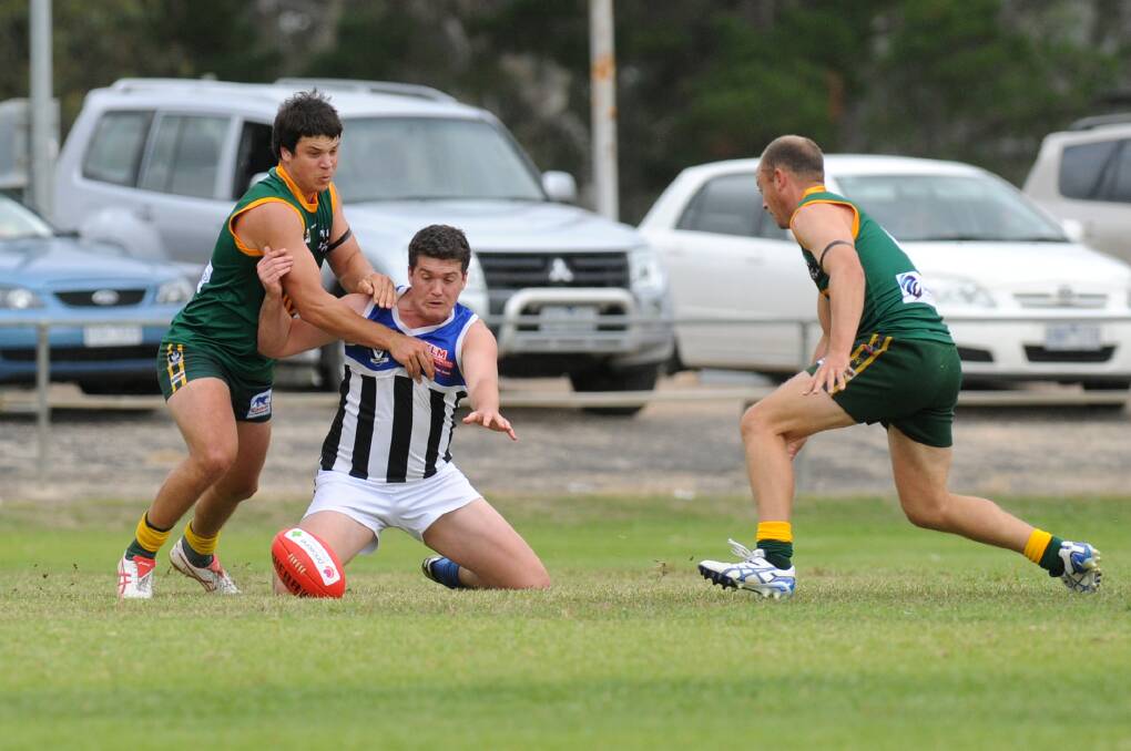 INTENSE: Dimboola's Lachie Exell and Minyip-Murtoa's Daniel Smith fight for the ball.