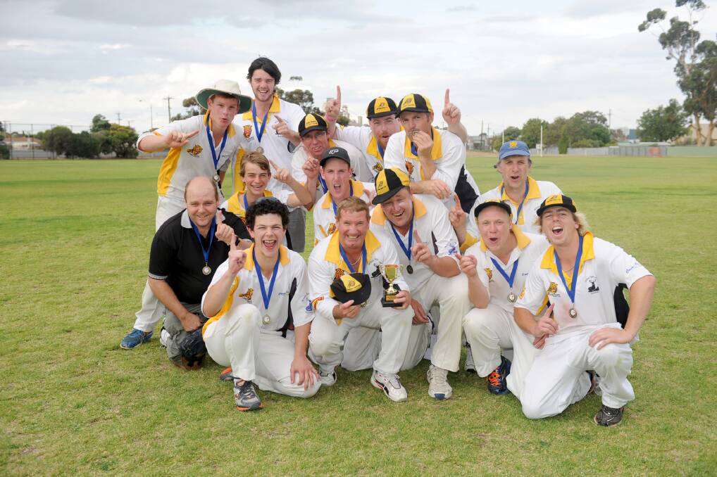 VICTORIOUS: Jung Tigers celebrate their C Grade premiership win against Homers at Dimboola Road oval. Pictures: SAMANTHA CAMARRI