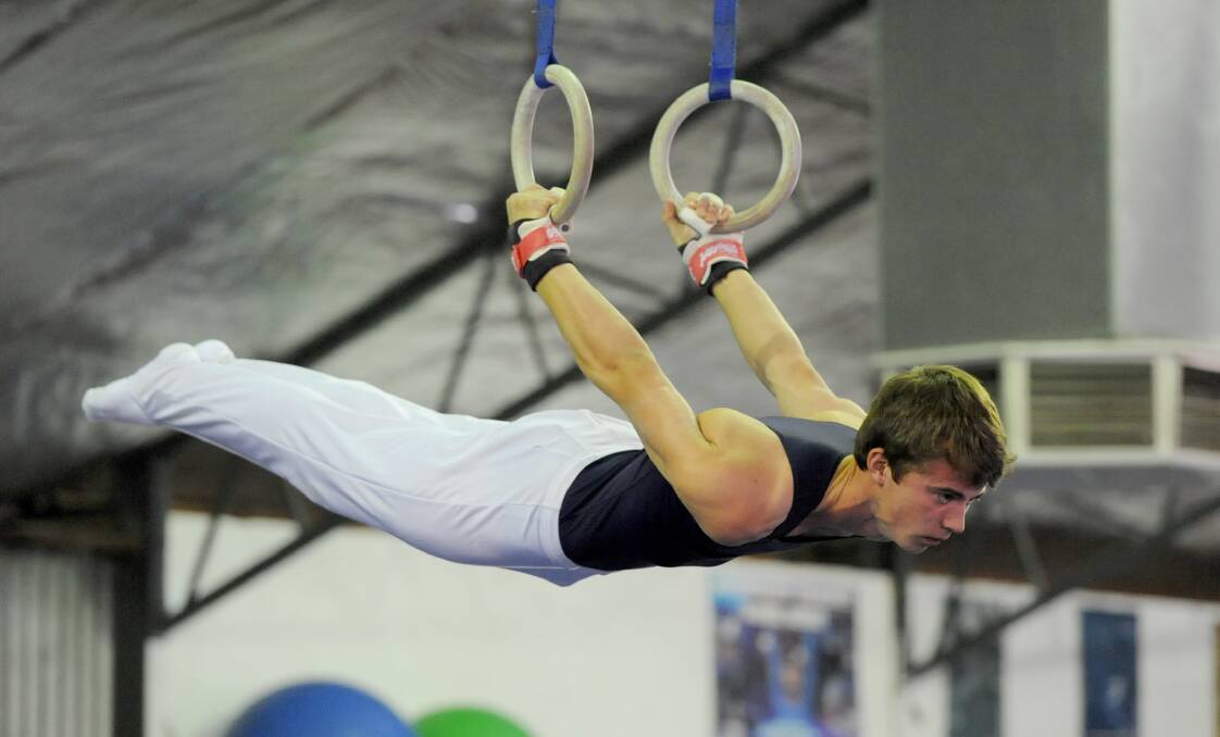 SUCCESS: Natimuk and District gymnast Ryan Morrow, pictured competing on the rings late last year, was one of eight club members to enjoy success in Warrnambool at the weekend. Picture: SAMANTHA CAMARRI