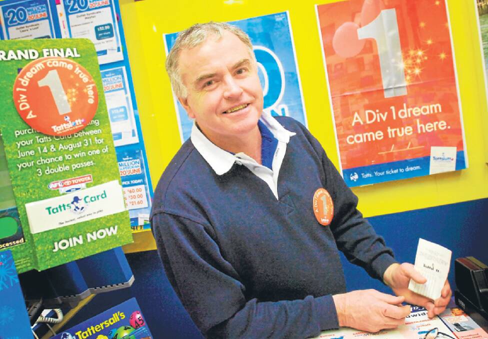 ALL SMILES: Horsham Plaza Lotto owner Paul McLean has been telling
customers about the store’s big division one winner. Picture: TIM HESTER