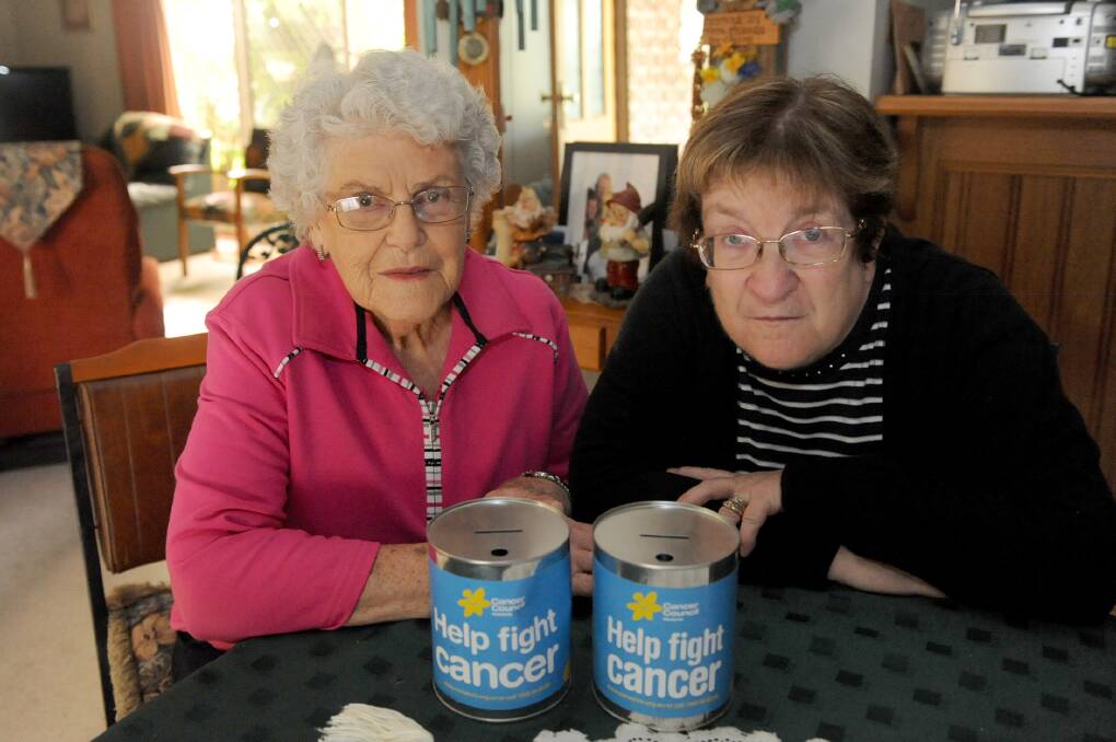 SURVIVAL FIGHT: Horsham Cancer Council secretary Dawn Hobbs and treasurer Jane Bolwell have appealed for new members to keep their charitable work going. Picture: SAMANTHA CAMARRI