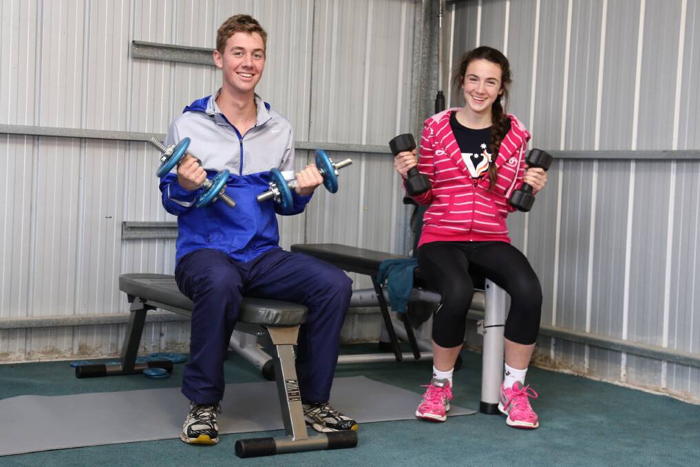 SUPERSTARS: Andrew Edgerton and Anna Bush. The pair performed well at the 2014 Little Athletics Victoria State Track and Field Championships in Melbourne. Picture: THEA PETRASS